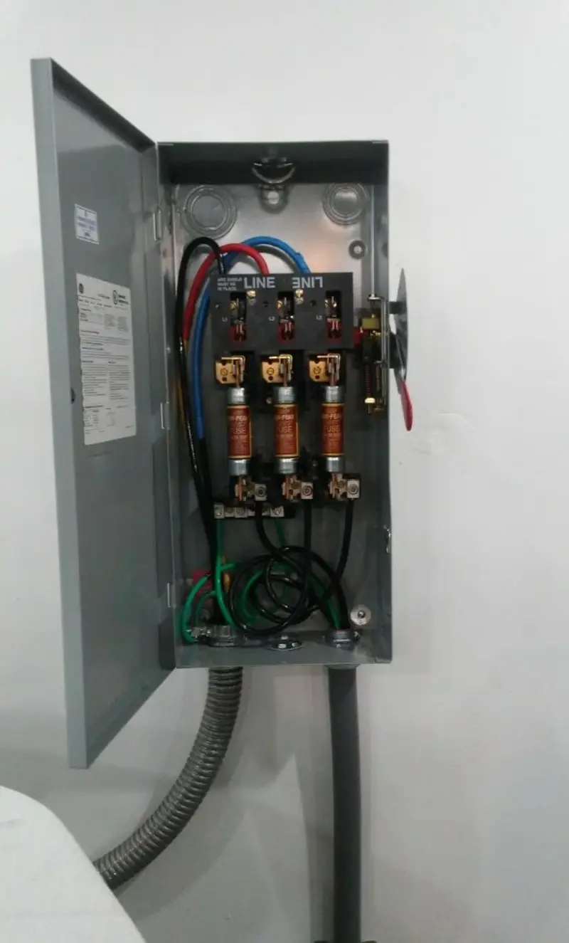 Three-phase disconnect switch installed for Smoke Detector Installation in Caldwell